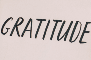 handwritten text on tan background