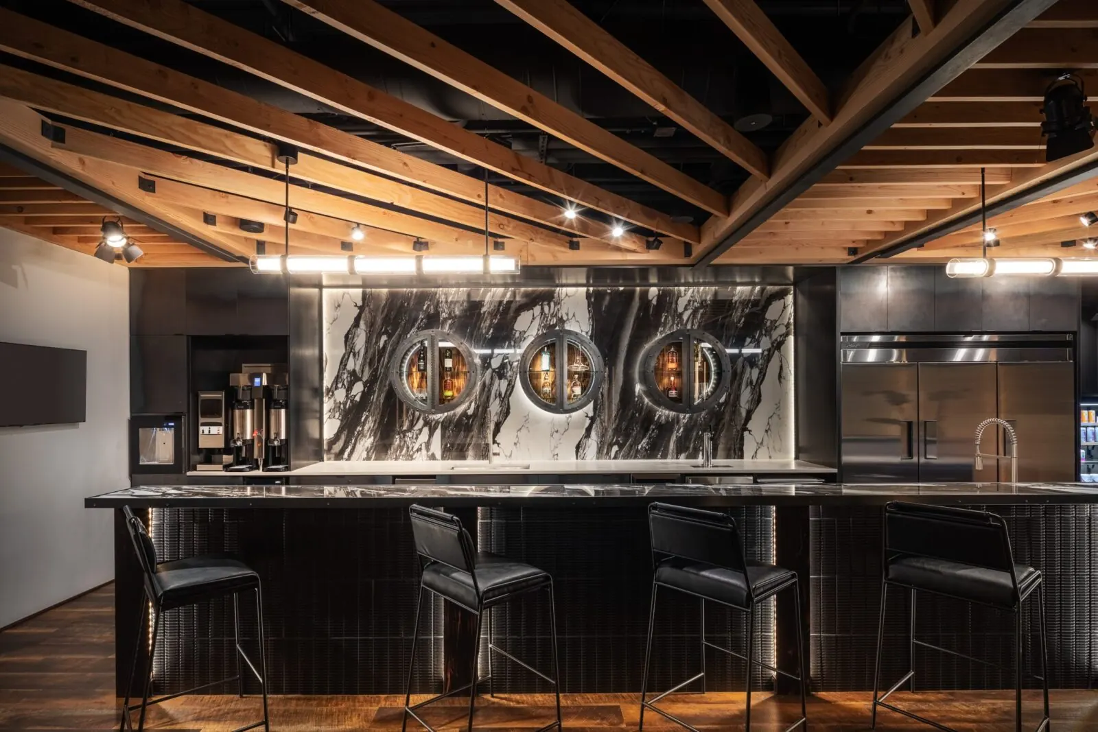 Shared workspace with communal desks, high-speed internet, and networking opportunities at Shift Workspaces