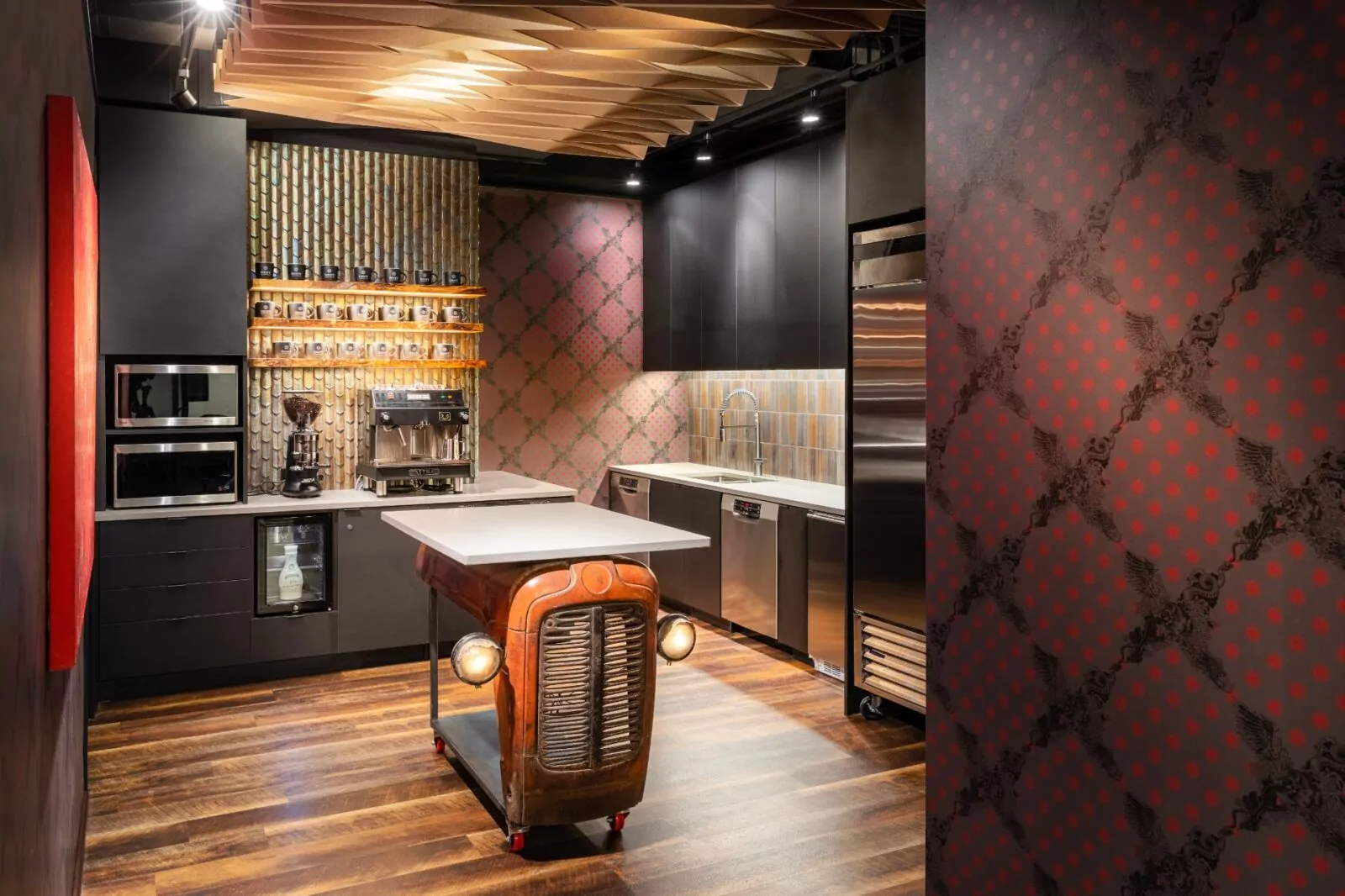 Eclectic kitchen space with retro island and bold design at Shift Workspaces Denver and Shift Workspaces Littleton