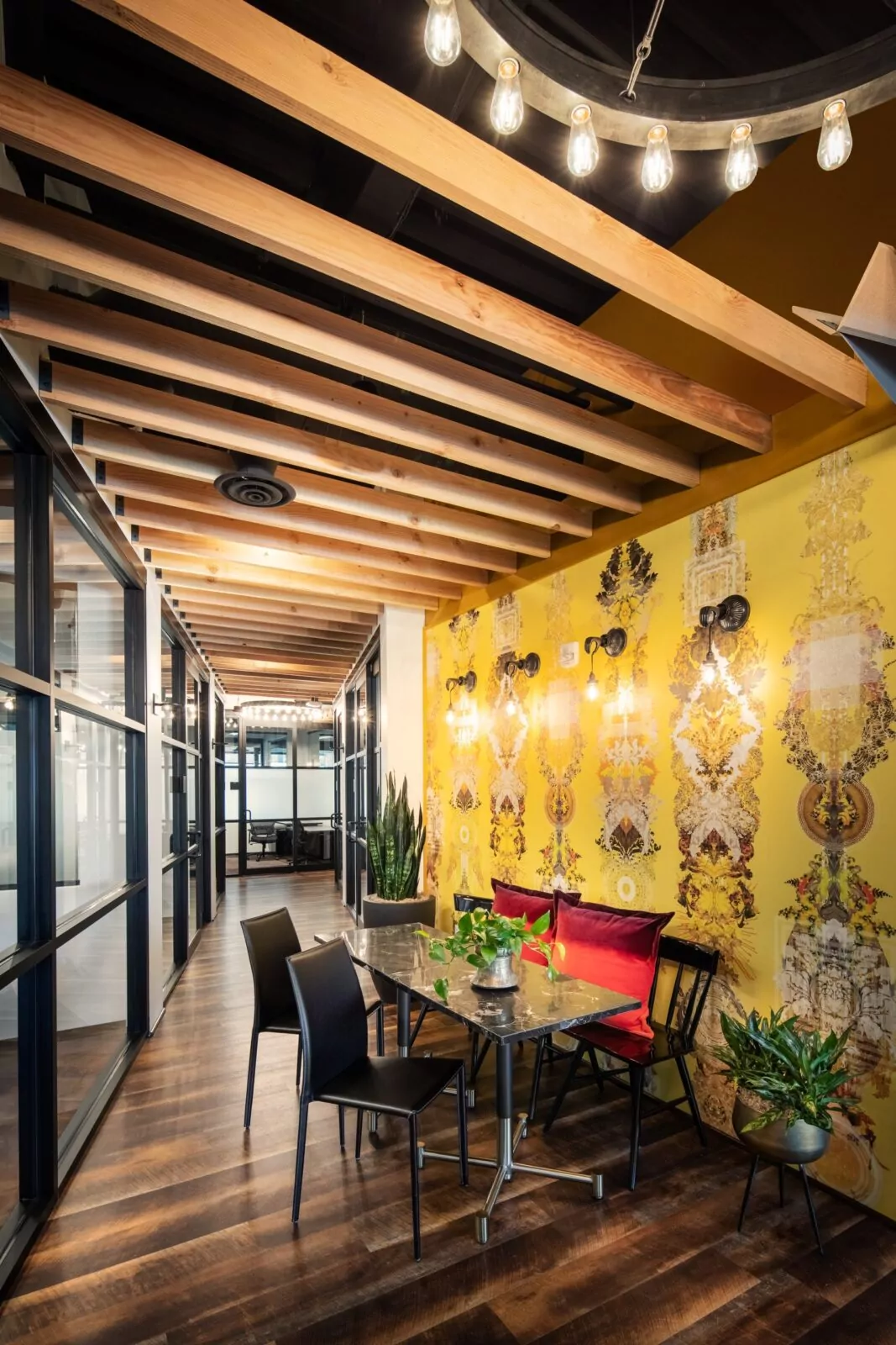 Stylish seating area at Shift Workspaces with warm lighting, modern decor, and a cozy ambiance