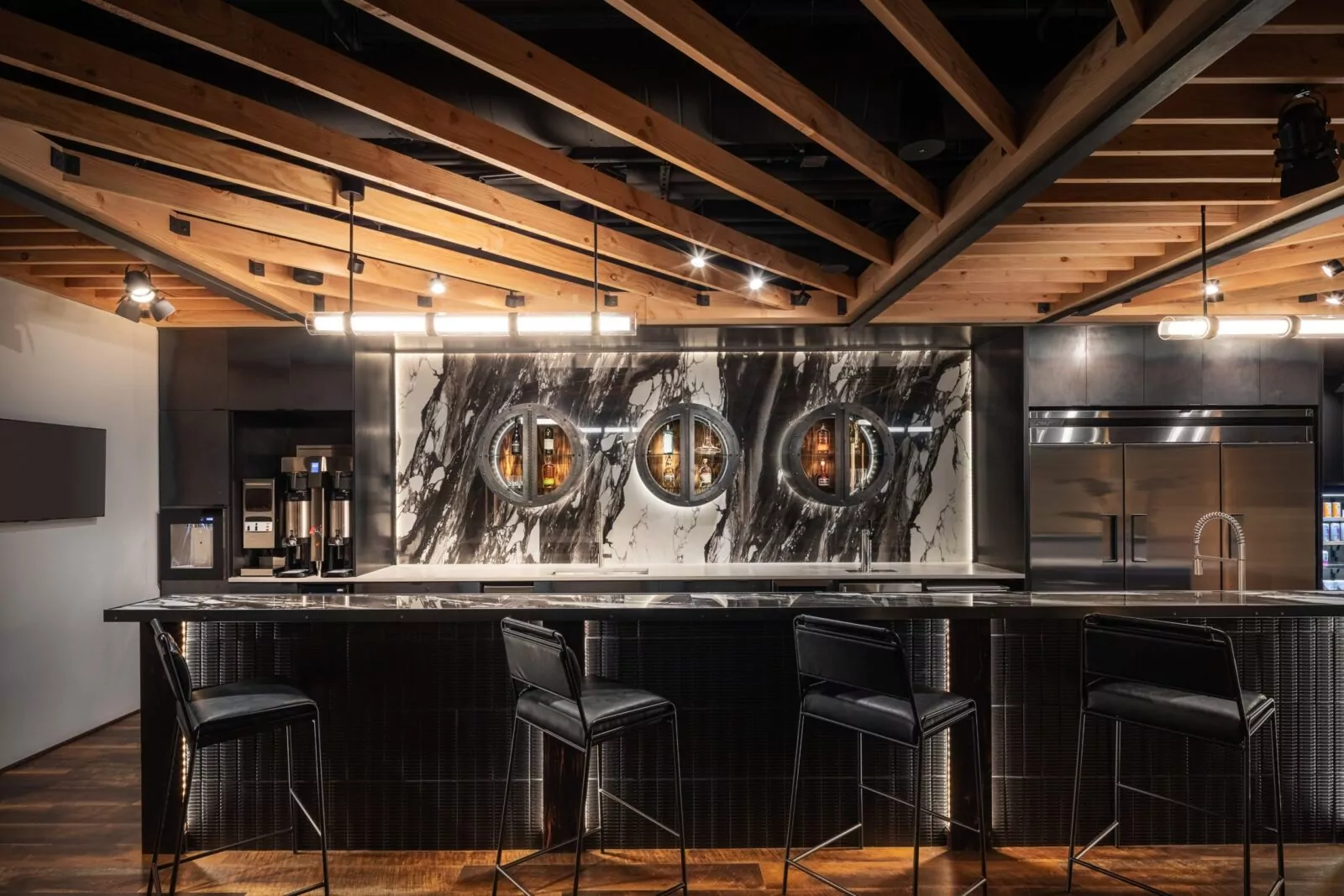 Shared workspace with communal desks, high-speed internet, and networking opportunities at Shift Workspaces