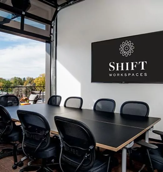 Shift Workspaces meeting space with sleek decor and comfortable seating for teams.