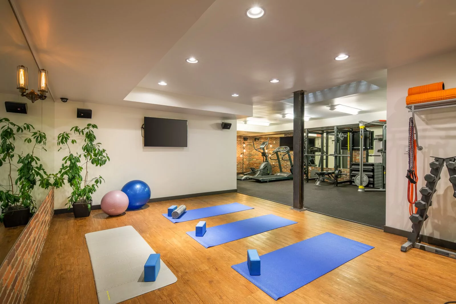Shift Workspaces fitness and wellness area with yoga mats, exercise equipment, and a calming atmosphere