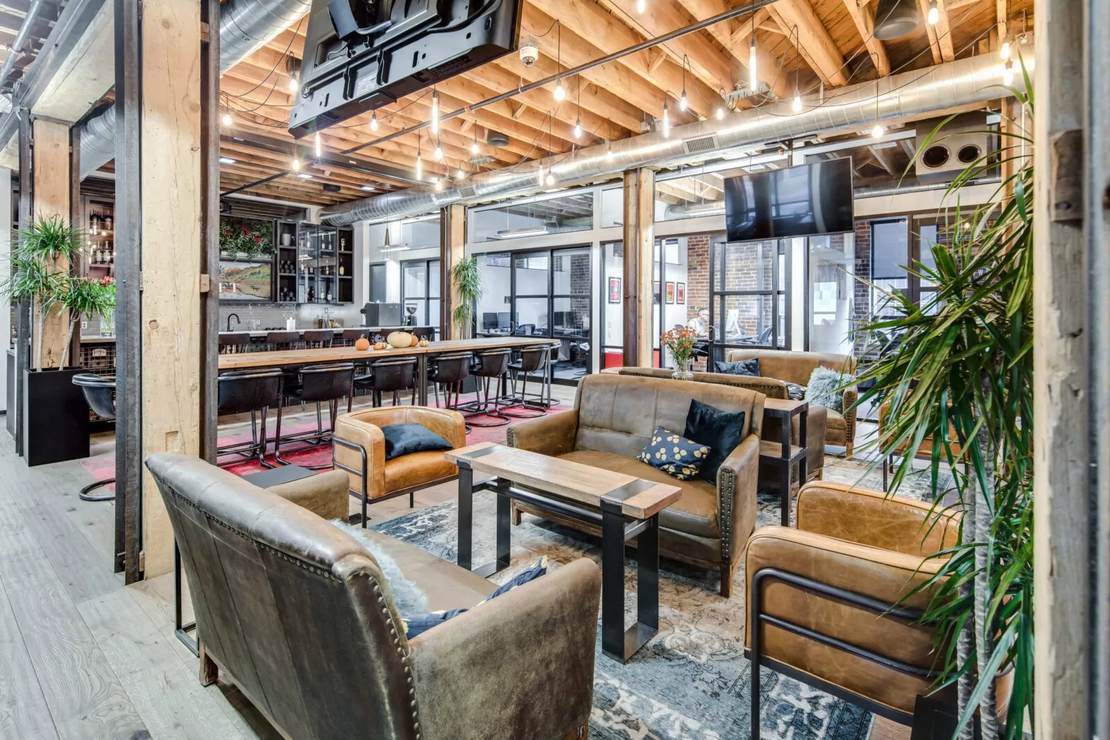 Lounge and kitchen at Shift Workspaces Bannock St in Denver Colorado